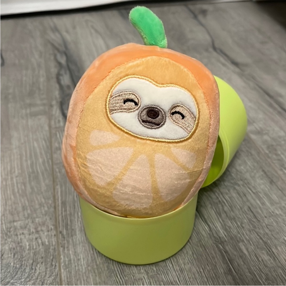 Sloth x orange Squishmallow